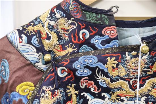 A Chinese embroidered silk and gold thread dragon jacket, late Qing dynasty, alterations